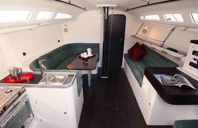 The dark colours of timber and soft furnishings work surprisingly well, largely because there is ample light in the cabin. - Sydney Yachts GTS43 © Crosbie Lorimer http://www.crosbielorimer.com